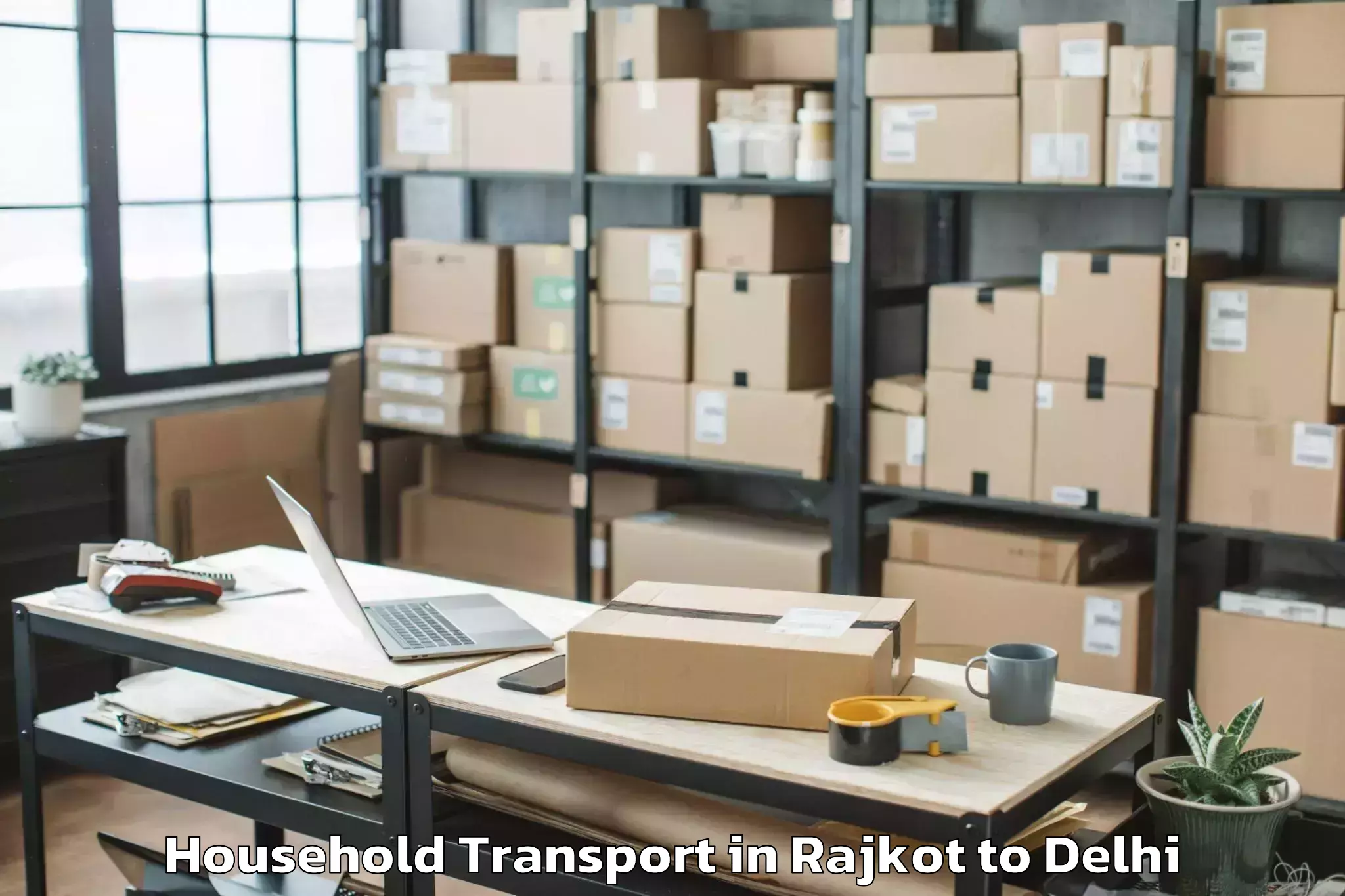 Get Rajkot to Flatted Factory Complex Okhla Household Transport